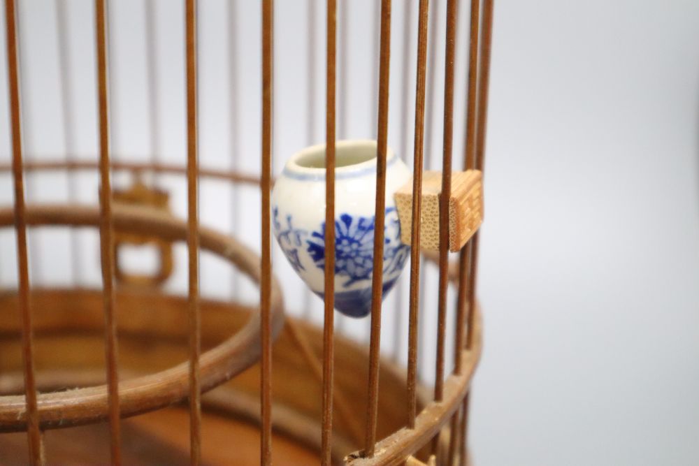 A Chinese bamboo bird cage, height 49cm